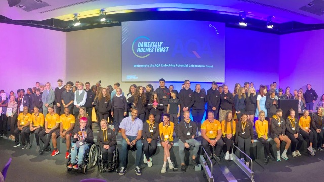 A group photo of staff and students at the AQA Unlocking Potential celebration event