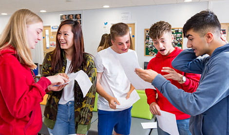five students reacting to exam results